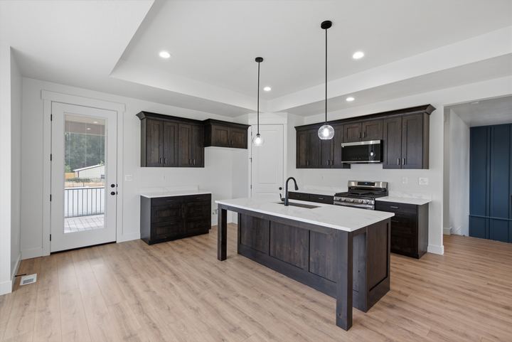 Isom Estates dark walnut kitchen