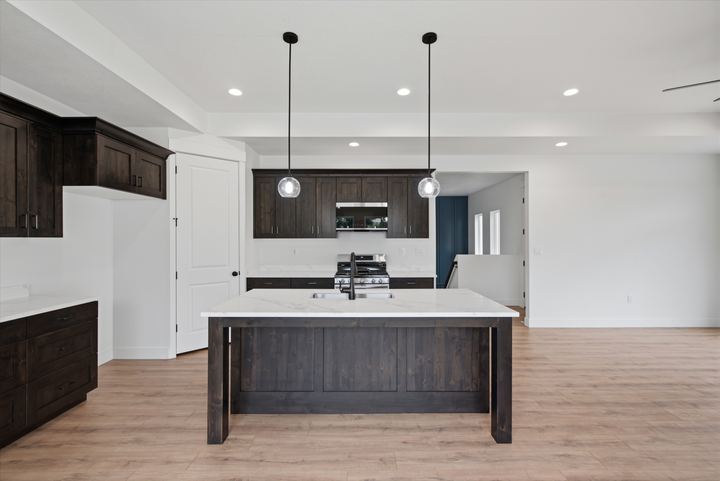 Kitchen island and range wall