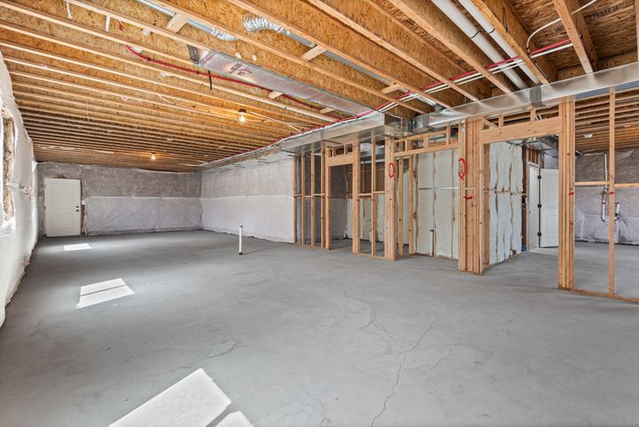 Unfinished basement, plumbed for a future ADU