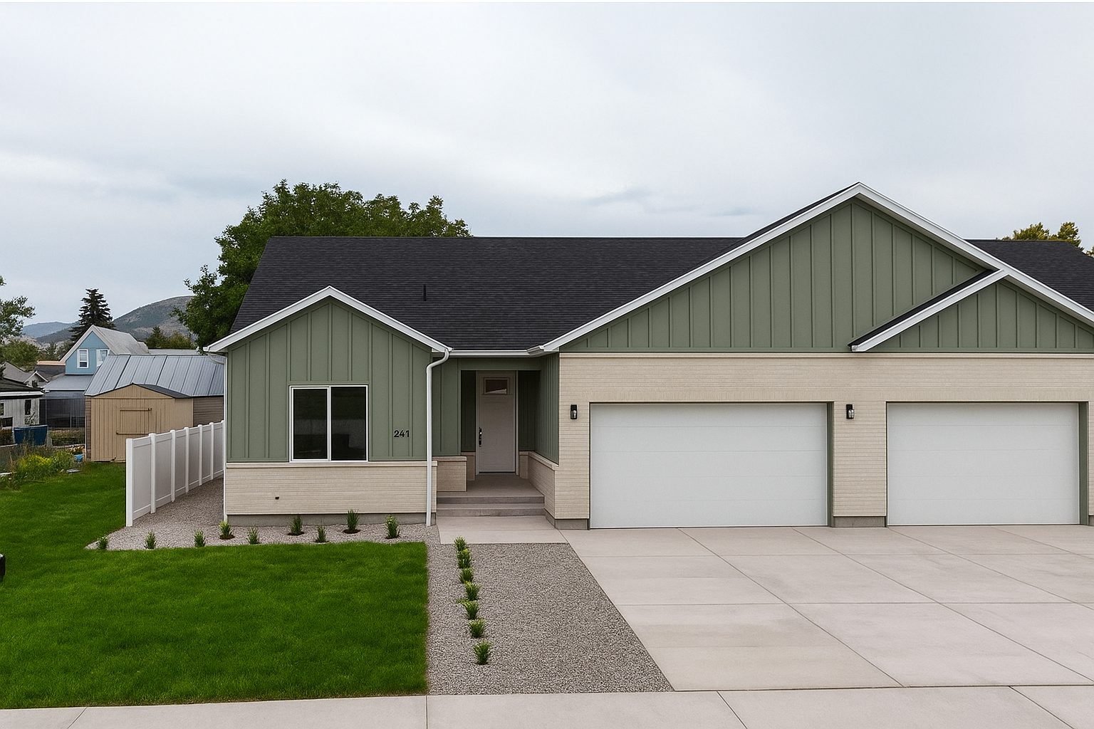 Craftsman twin homes with landscaped yard